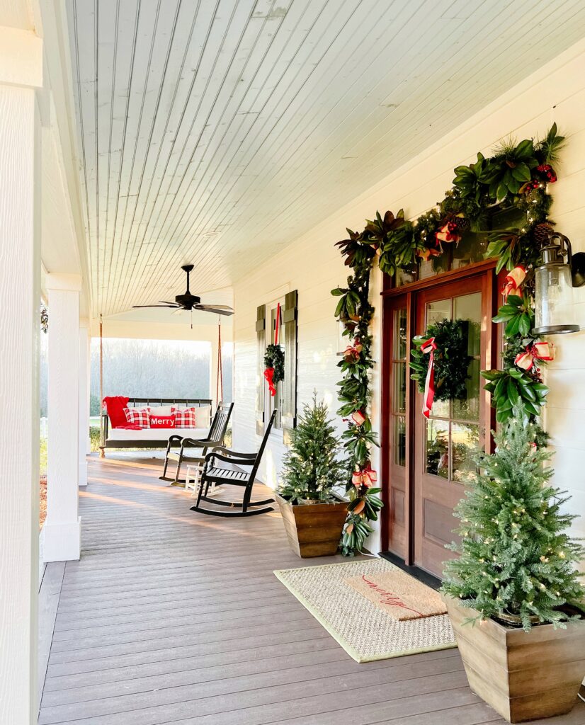winter front porch with garland