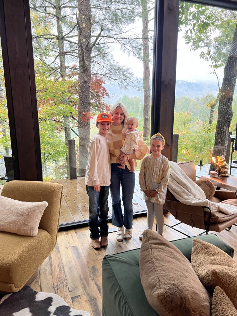 family in treehouse cabin